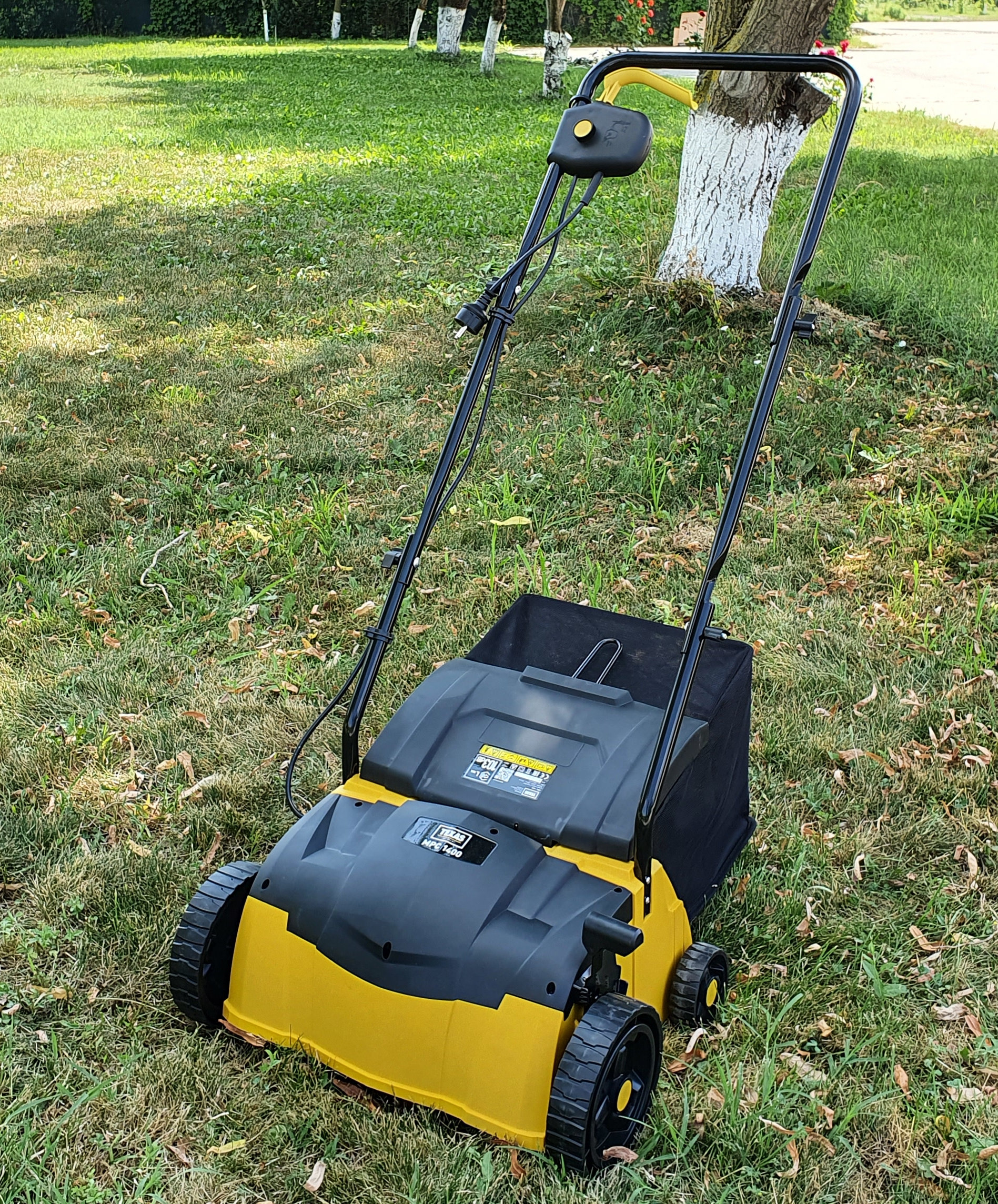 Texas MPC 1400 scarificator aerator gazon 2-in-1, motor electric 1400W, sac 35 litri, latime lucru 32cm, reglaj central