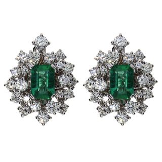 Damiani earrings made of 18K white gold with diamond and emerald