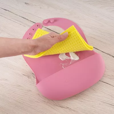 Bavetica din silicon moale cu buzunar colector pentru bebelusi, reglabila, roz, Reer Eat`n Tidy 25044