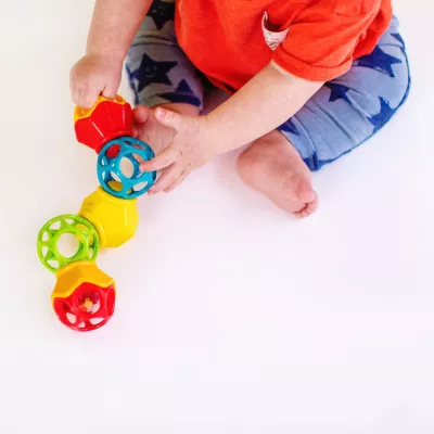 Bright Starts - Jucarie Clicky Twister  Easy-Grasp Rattle Oball