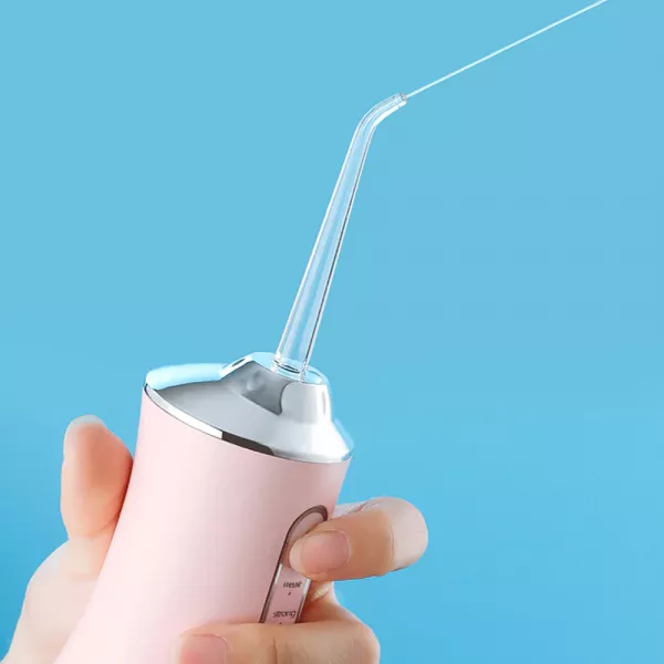 Irigator bucal profesional, dus bucal, Lila Care, Ultra-Portabil, 4 Capete Curatare, rezervor 220 ml, roz